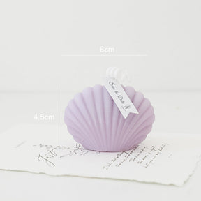 bougie coquillage violet