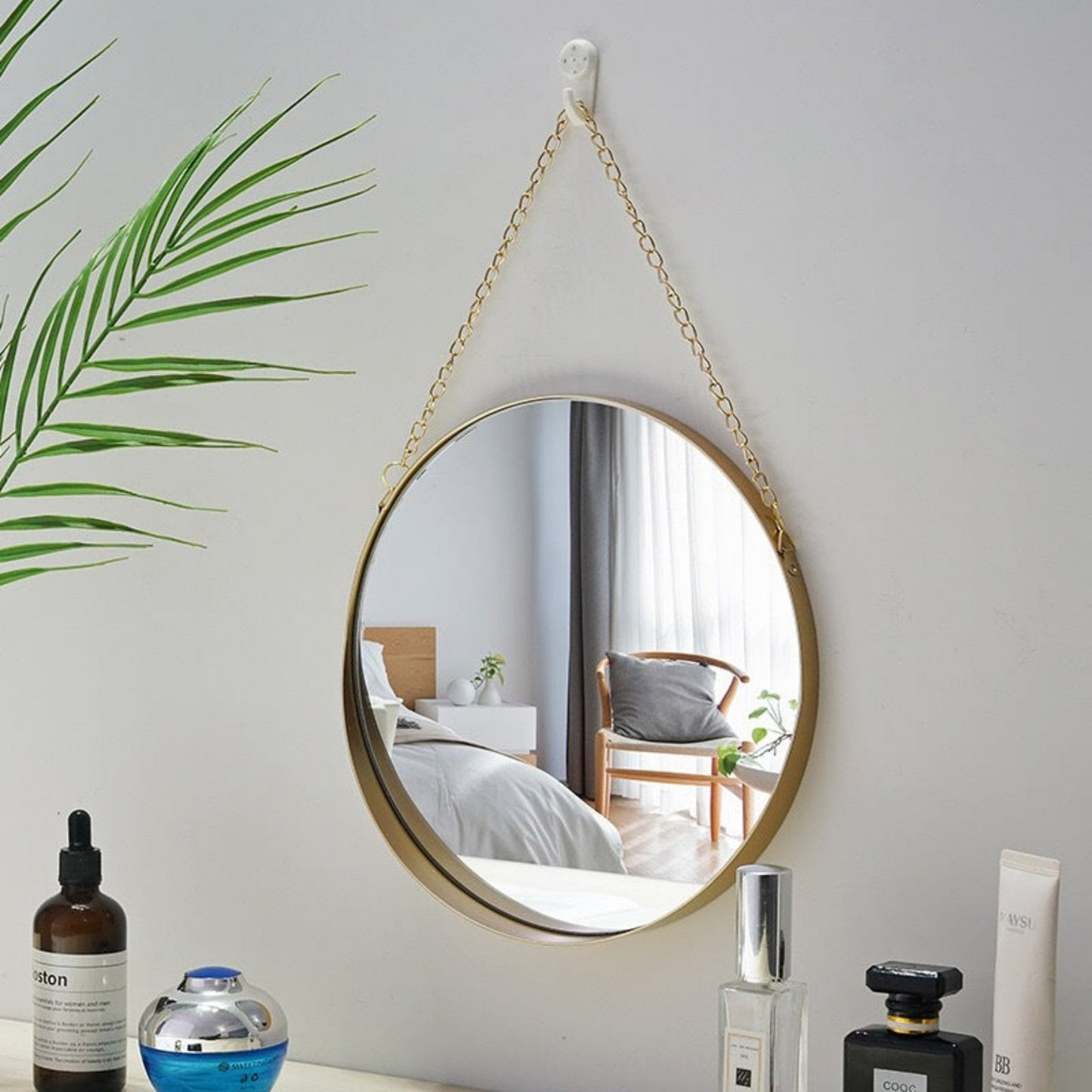 miroir décoratif rond métal et chainette