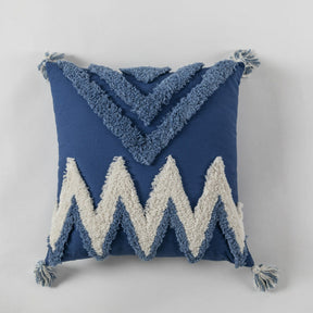 coussin bleu avec du blanc