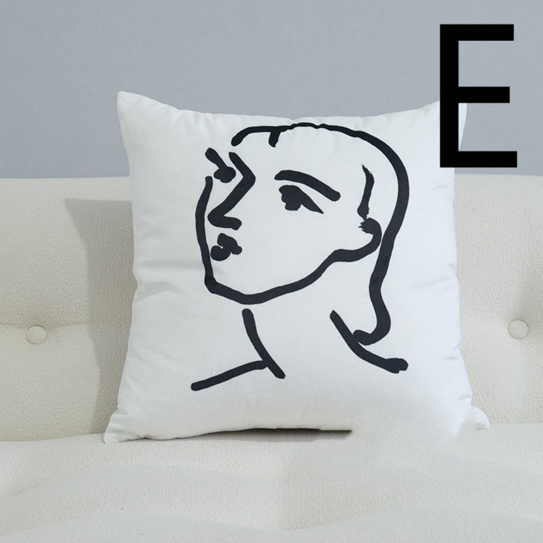 coussin blanc tête avec visage