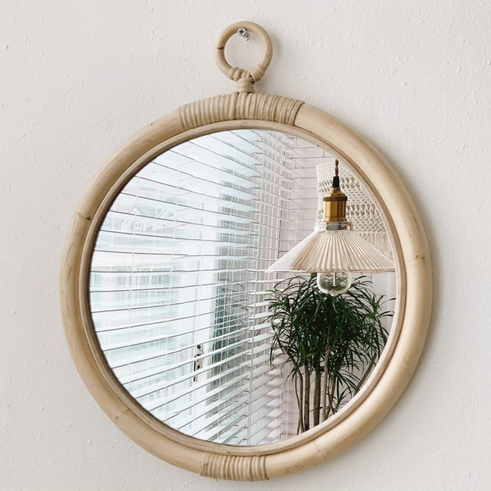 miroir rond en rotin