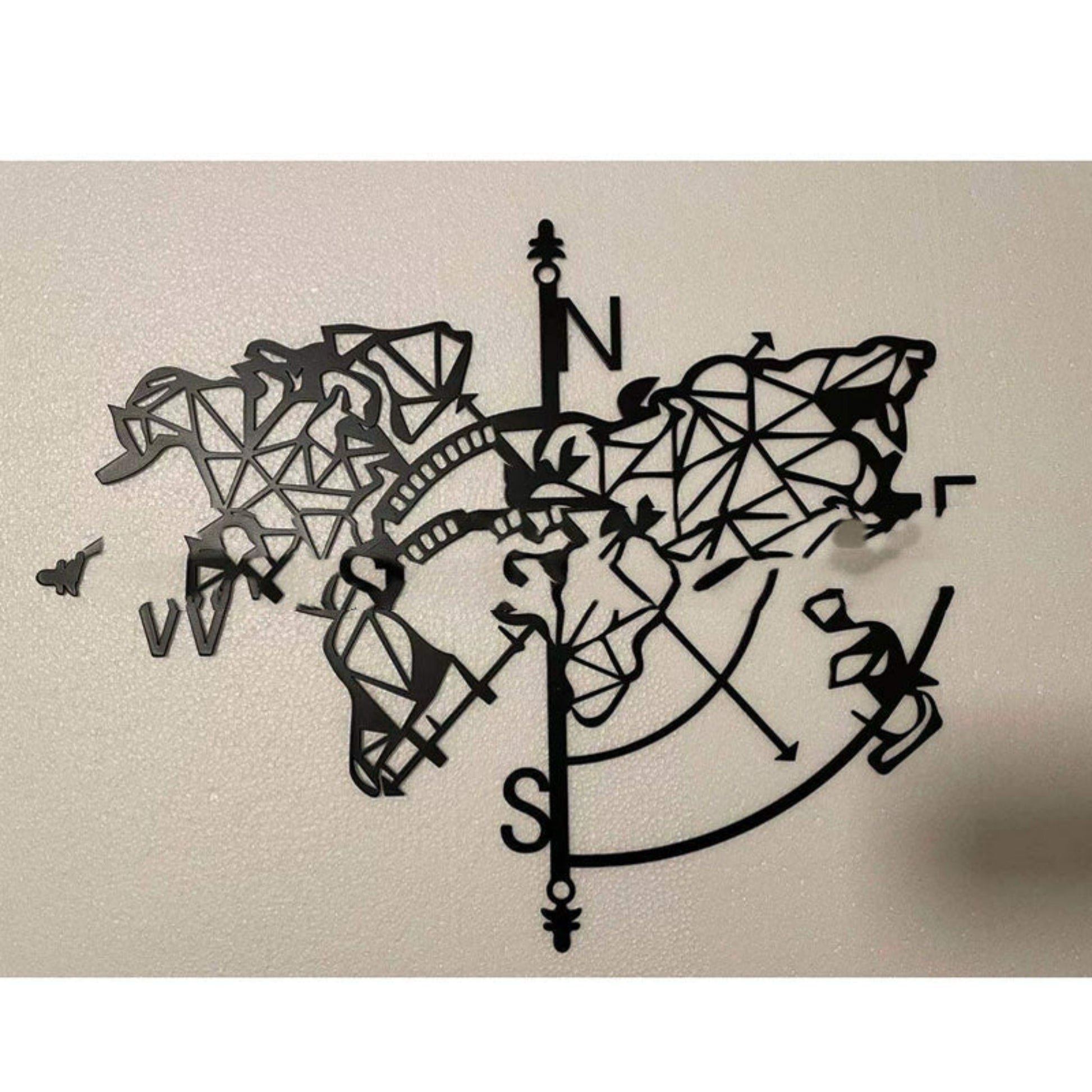 décor mural en métal noir rose des vents